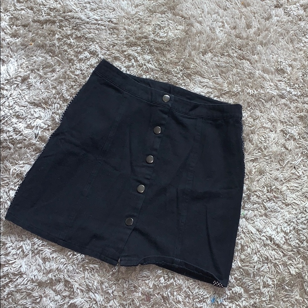 a black skirt with checker details.